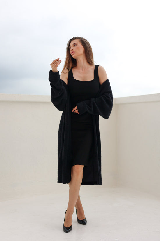 Black fluffy cardigan by FYZE