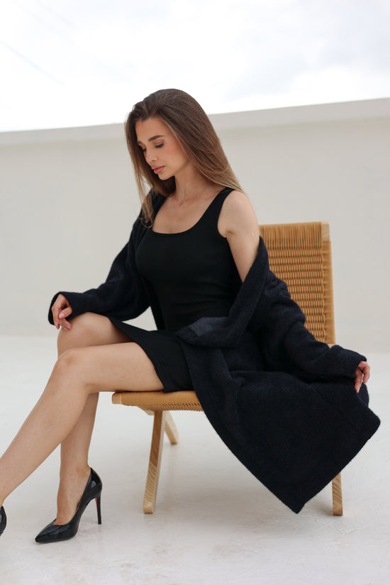 Black fluffy cardigan by FYZE